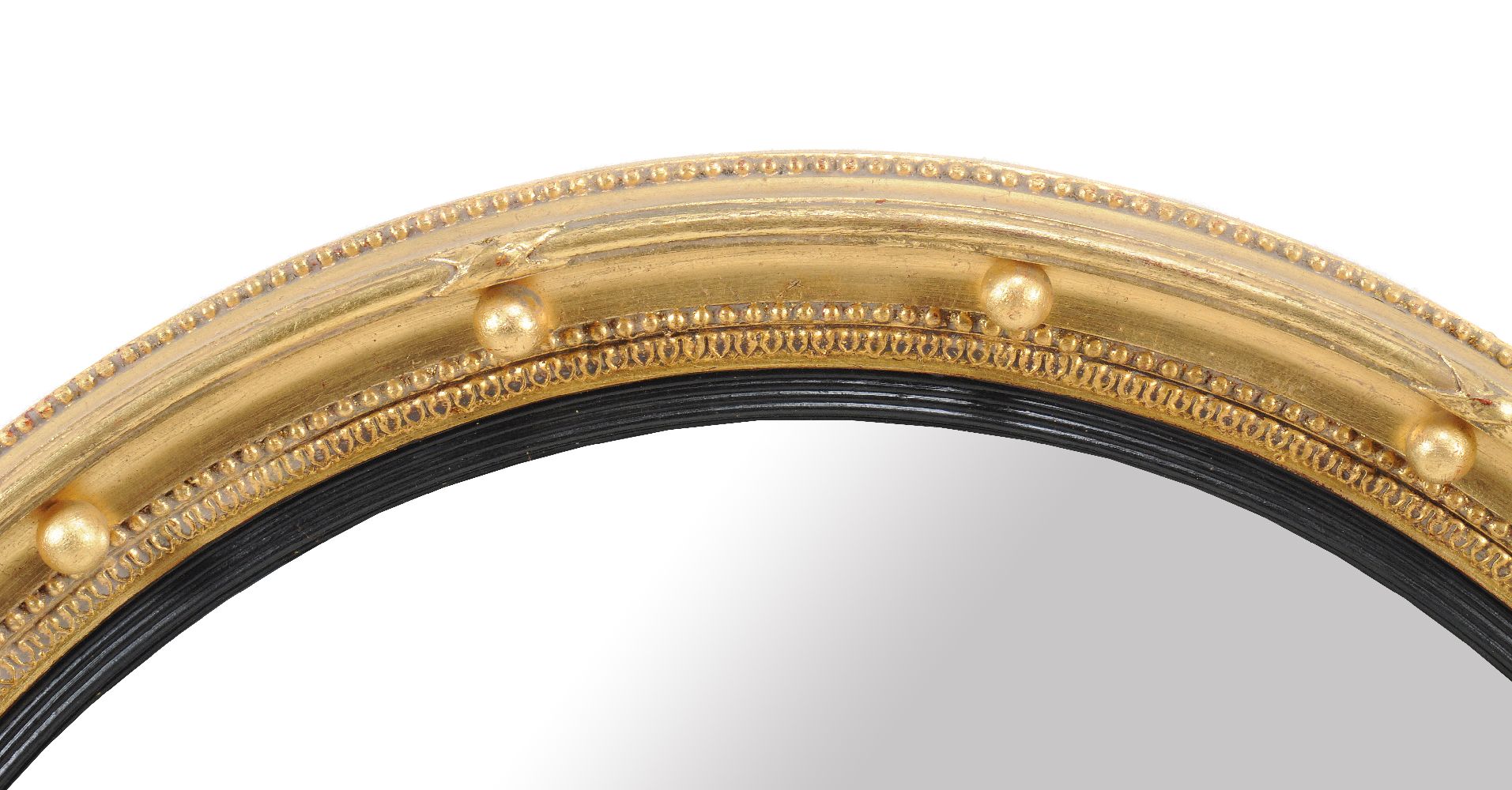A giltwood convex wall mirror in Regency style, 20th century, 90cm diameter Provenance: Property - Image 2 of 3