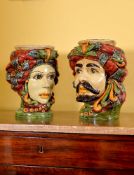 A pair of modern Sicilian Maiolica style figural head jars or planters, modelled wearing turbans,