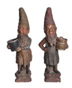 A pair of Austrian polychrome terracotta models of gnomes, circa 1900, impressed BB to interior of