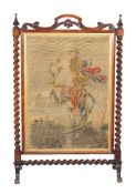 Y A Victorian rosewood fire screen, circa 1860, the needlework banner embroidered with cavalryman