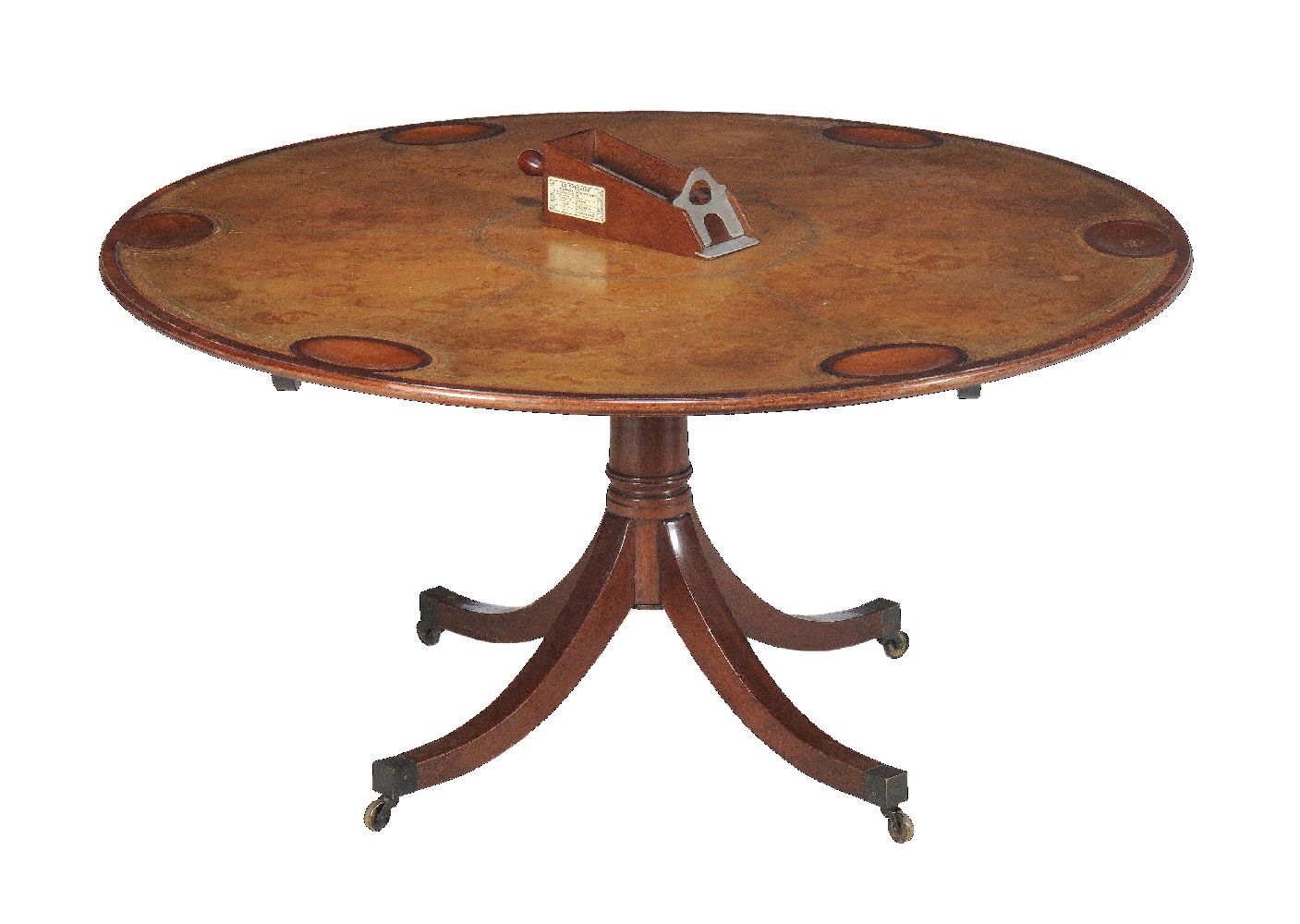 A mahogany and gilt tooled leather inset pedestal games table, in George III style, 20th century,