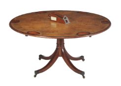 A mahogany and gilt tooled leather inset pedestal games table, in George III style, 20th century,