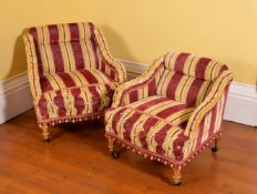 A companion pair of Victorian giltwood and upholstered low arm chairs, circa 1870, the larger 67cm