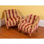 A companion pair of Victorian giltwood and upholstered low arm chairs, circa 1870, the larger 67cm