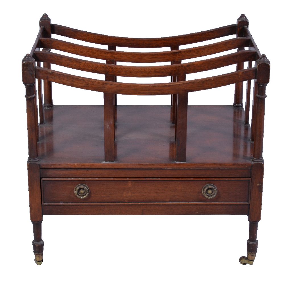 A Regency mahogany Canterbury, circa 1820, with swept top above the triple dividers and frieze