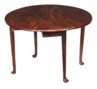 A George II mahogany gateleg table, circa 1750, the drop leafs above tapering legs and pad feet,