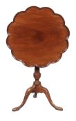 A mahogany tripod table in George III style, 19th century, with birdcage action above a fluted