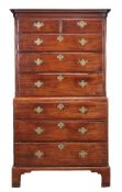 A George III mahogany chest on chest, circa 1780, with two short and three long drawers flanked by