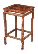 A Chinese hardwood and inlaid occasional table, the top with exterior scene with figures, 74cm high,