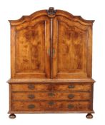 A Dutch walnut and crossbanded press cupboard, last quarter 18th century, the pair of doors