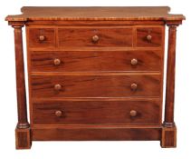 A Victorian mahogany chest of drawers, mid 19th century, probably Scottish, the shaped top above
