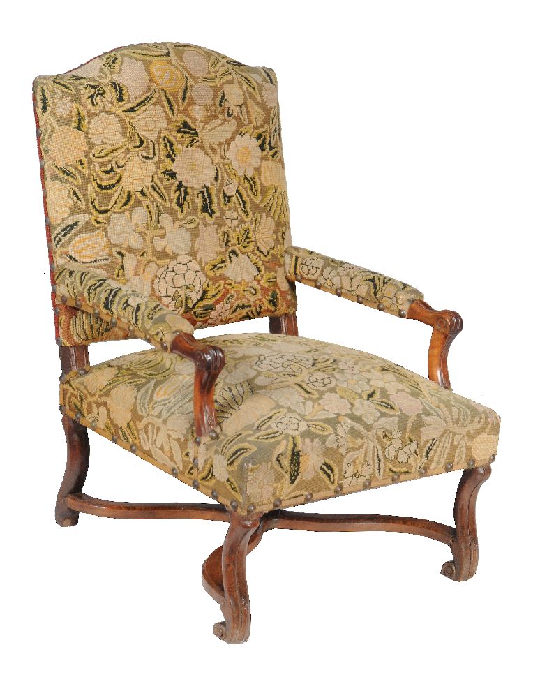 A walnut, beech and tapestry upholstered armchair, first half 18th century, 101cm high, 69cm wide,