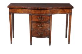 A George III mahogany serpentine fronted serving table, circa 1790, inlaid with stringing, the