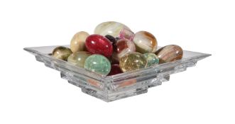 A collection of polished hardstone models of eggs, 20th century, of varying type and size, the