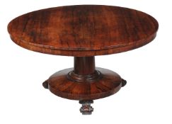 Y A William IV rosewood centre table, circa 1835, the circular top above a substantial pillar,