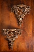 A pair of giltwood and composition wall brackets or small console tables, second half 19th