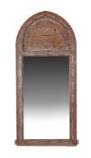 A Moroccan hardwood and polychrome painted wall mirror, 19th century, with stylised starburst