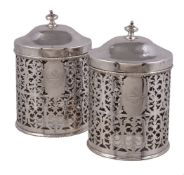 A pair of Edwardian silver cylindrical and pierced biscuit boxes by William Hutton & Sons, Sheffield