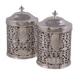 A pair of Edwardian silver cylindrical and pierced biscuit boxes by William Hutton & Sons, Sheffield