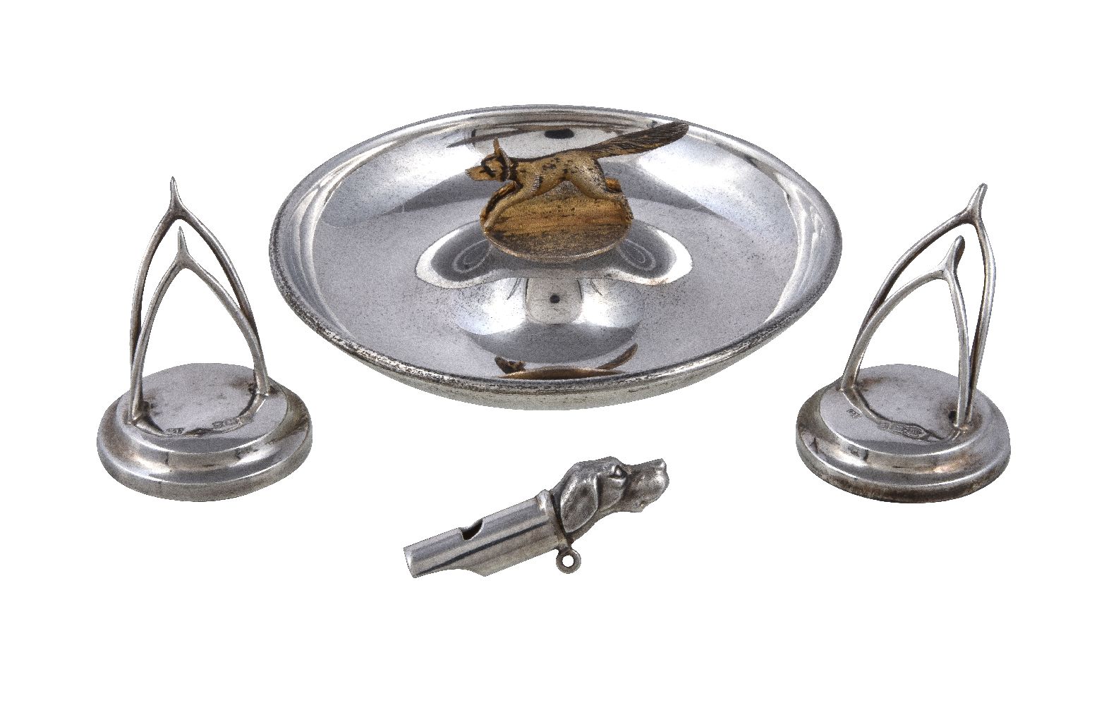 Four silver novelty items, comprising: a silver parcel gilt ash or counter tray, maker's mark G&
