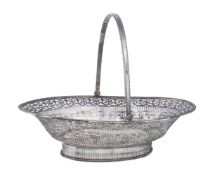A George III silver oval cake basket, maker's mark obscured, London 1781, with a beaded swing handle