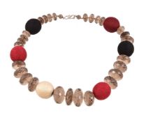 A smokey quartz fashion necklace, the graduated facetted smokey quartz necklace with red, black