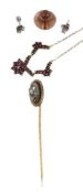 A Bohemian garnet necklace, from the first half of the 20th century, the round cut garnets claw