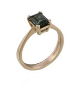 An 18 carat gold single stone tourmaline ring, the step cut tourmaline with canted corners, with