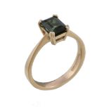 An 18 carat gold single stone tourmaline ring, the step cut tourmaline with canted corners, with