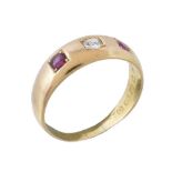 A Victorian 18 carat gold ruby and diamond ring, the central old cut diamond set between two