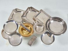 A collection of silver ashtrays, to include: a square ashtray by A. & J. Zimmerman Ltd.,