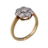 A 1930s diamond cluster ring, the millegrained setting set with old cut diamonds, approximately 0.93