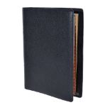 Gucci, a black leather address book, the interior with gilt edged lined paper with brown leather