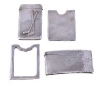 Two silver card cases and two sleeves, the first case Edwardian curved rectangular and hammered by