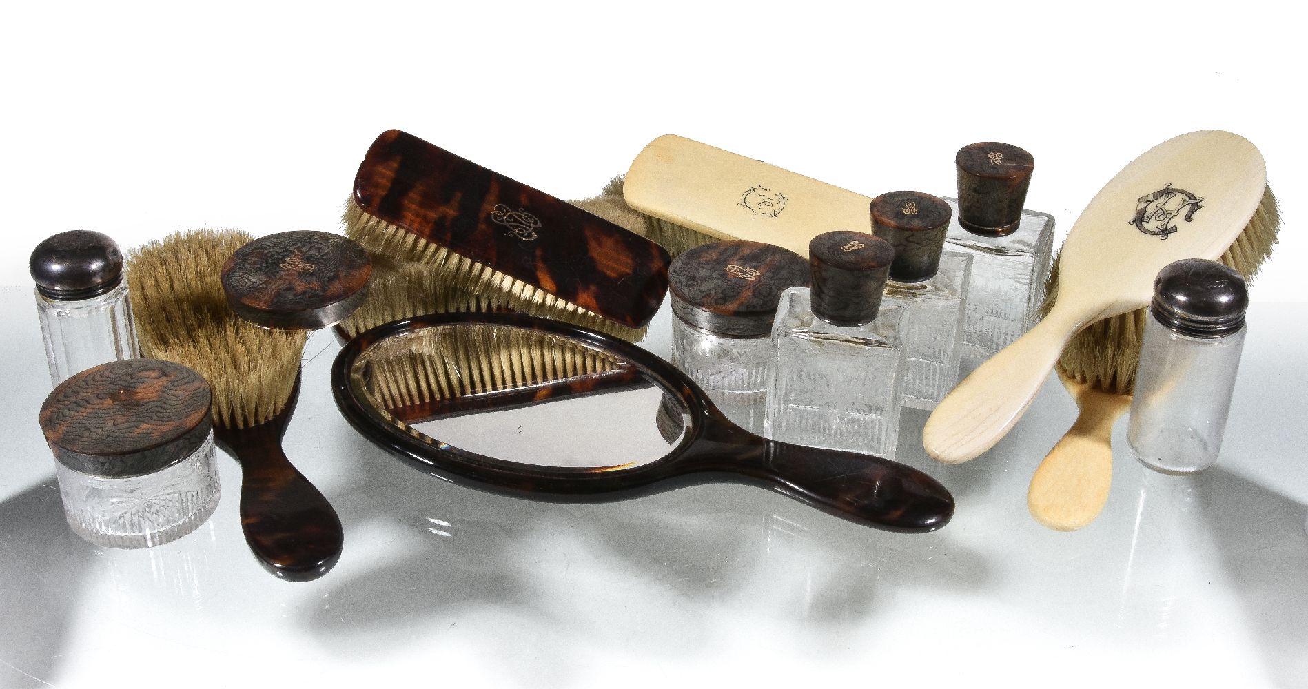 ϒ A tortoiseshell mounted dressing table set, unmarked, circa 1900