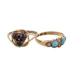 A Victorian 18 carat gold turquoise and seed pearl ring, the two circular cabochon turquoise with