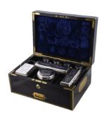 ϒ A Victorian silver mounted travelling toilet set by Frances Douglas, London 1844, comprising of