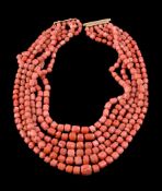 ϒ An Italian coral bead necklace, the multi strand necklace composed of graduating coral beads