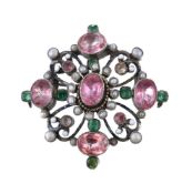 An Austro Hungarian foil backed topaz, emerald, half pearl and enamel brooch, circa 1900, the