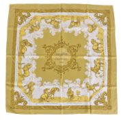 Hermes, Courbettes et Cabrioles, a yellow silk scarf, designed by Francoise Faconnet, with horses on