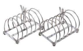 A pair of Edwardian six division toast racks with W handles by Atkin Brothers, Sheffield 1901,