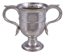 A George III silver twin handled pedestal cup by William Collings, London 1774, with twin scroll