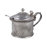 A George IV silver drum mustard pot, maker's mark WE or WF, London 1825, with a ball finial to the