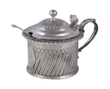 A George IV silver drum mustard pot, maker's mark WE or WF, London 1825, with a ball finial to the