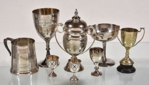 A collection of silver items, to include: a silver twin handled cup and cover by Charles S.