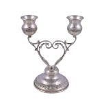 An Israeli silver coloured small candelabrum, stamped Hazorfin 925, with two baluster capitals on