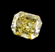 An unmounted coloured diamond, the rectangular fancy cut yellow coloured diamond, weighing