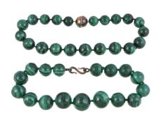 A malachite bead necklace, the graduated polished malachite beads, measuring approximately 2cm to