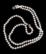 A cultured pearl, sapphire and diamond necklace, the two strands of uniform cultured pearls,