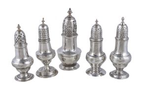 Five Georgian silver baluster castors, to include: a George II baluster castor by Samuel Wood,